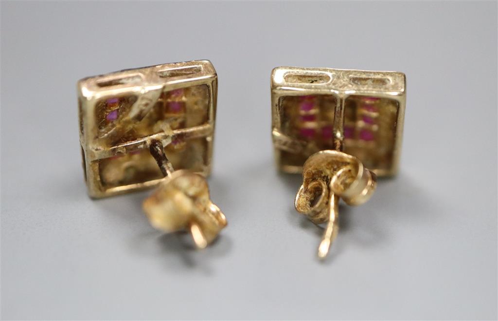 A small modern pair of 9ct, ruby and diamond set square cluster ear studs, 9mm, gross 1.9 grams.